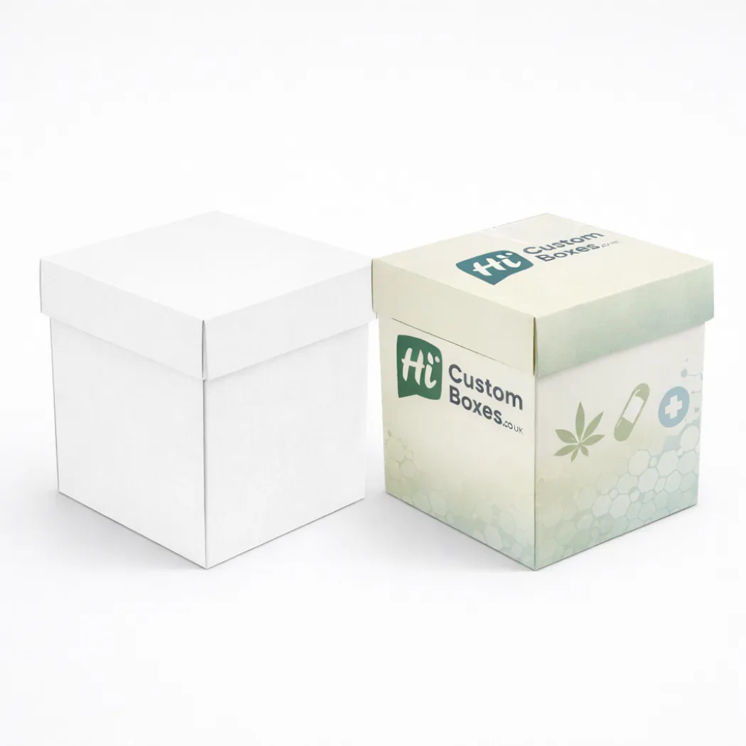 Two upright tuck-top cardboard cartons- one blank and one featuring a CBD leaf and medical icon- class=
